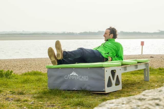 Jordan Boon, from Southsea, with the CamperCars system box. Picture by Mike Woods at Solent Sky Services