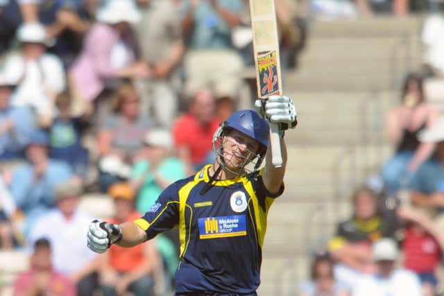 Hampshire's Jimmy Adams celebrates his century against Surrey Lions in 2010. Picture: Robin Jones