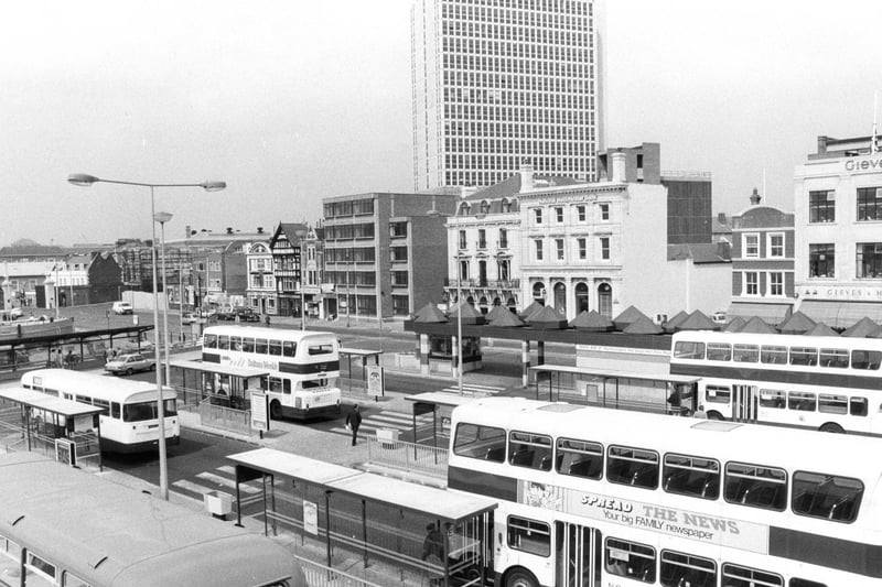Buses waiting at The Hard, Portsmouth in May 1980. One of the buses shows an old advertisement for The News