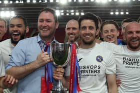 Former Hawks boss Lee Bradbury, left, and Brian Stock with the trophy following the club's Hampshire Senior Cup triumph in 2018 Picture: Chris Moorhouse