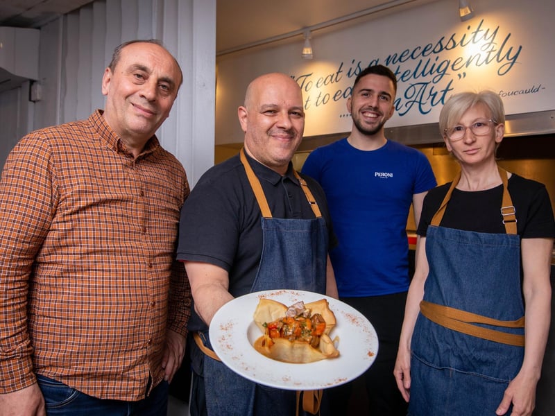 El Greco at 8 - 9 Bellevue Terrace, Southsea was rated 5 on April 18.Pictured: Staff at El Greco, Kristo Serani, Nikolaos Zarkadas, Entela Serani and Vaggelis Banos with their signature dish,Lamb KleftikoPicture: Habibur Rahman
