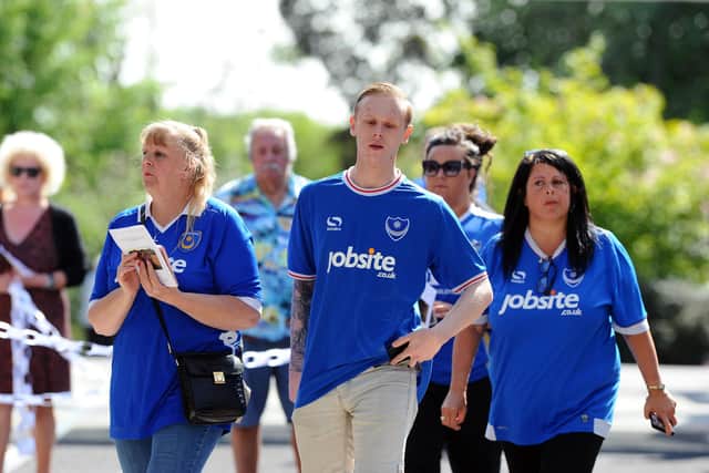 Well-wishers at Portchester Crematorium sporting Pompey uniforms in honour of beloved fan Dom Merrix
Picture: Sarah Standing (270420-1129)