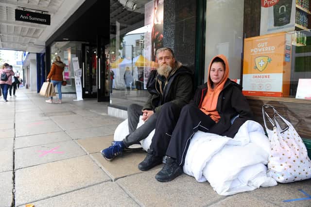 Roy Ransom (48) and Tamsin Jones (37) are homeless in Portsmouth, and have been served a fine of £100 by Portsmouth City Council because they left their bedding unattended outside Ann Summers in Commercial Road, Portsmouth. They have no means of paying this.
Picture: Sarah Standing (151020-5844)