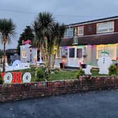 John and Mak Mumby from Cowplain have transformed the front of their home into Christmas wonderland to raise money for the Rowans Hospice