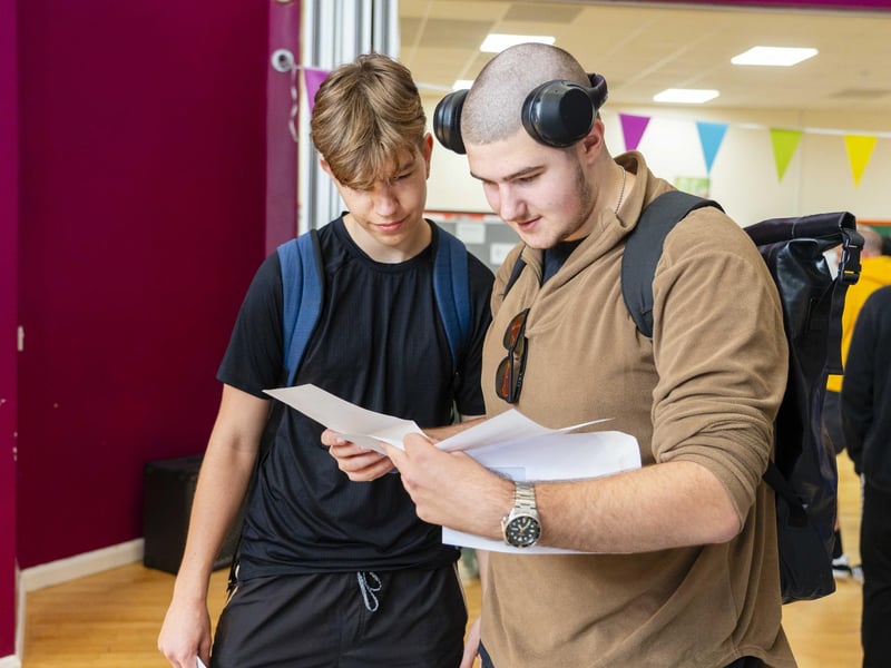 James & Mantvydas check their results at City of Portsmouth College results day 2024