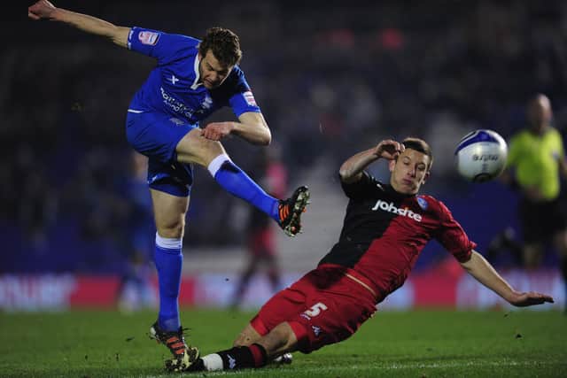 Jason Pearce attempts to block Jonathan Spector's shot during Pompey's trip to Birmingham City in February 2012. Picture: Jamie McDonald/Getty Images