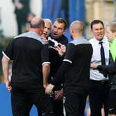 Derek Adams and Pompey lock horns once again today.