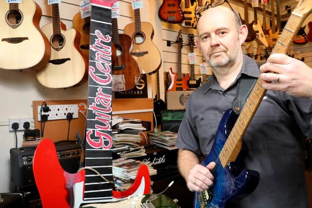 Business owner Steve Wright. Guitar Centre Southsea on Highlands Road faces closure. A crowdfunding page has been opened to help the business relocate to Cosham. Picture: Chris Moorhouse (jpns 071222-25)
