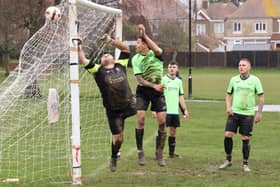 The Bedhampton keeper can't keep out the Wicor Mill equaliser. Picture by Kevin Shipp