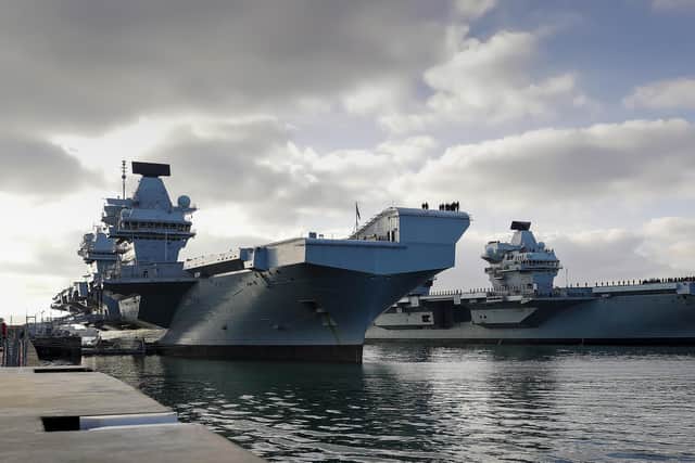 HMS Queen Elizabeth and HMS Prince of Wales, Britain's aircraft carriers, come together in their home port of Portsmouth for the first time at Portsmouth Naval Base last year. Photo:Leading Photographer Ben Corbett