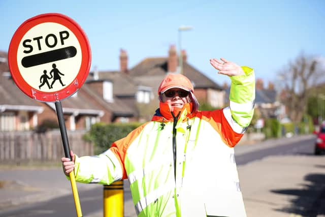 Sue Chase is celebrating 25 years as a lollipop lady outside Hook-with-Warsash Primary School, in Church Rd, Warsash
Picture: Chris Moorhouse (jpns 070521-02)