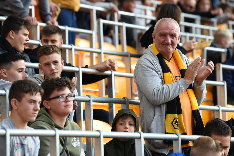 Fans wait in seats with built-in safety barriers, known as rail seating, to allow safe standing, ahead of the English Premier League football match between Wolverhampton Wanderers and Manchester United at the Molineux stadium in Wolverhampton, central England on August 19, 2019. ( PAUL ELLIS/AFP via Getty Images)