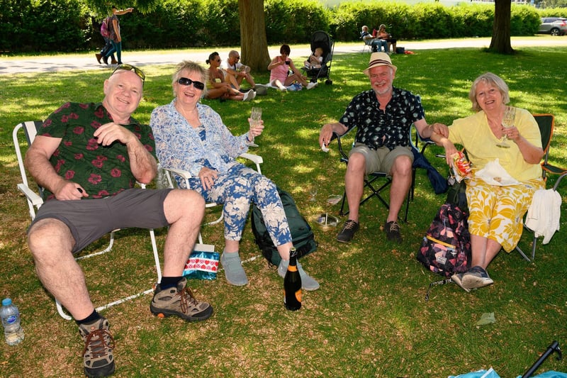 Pictured is: Paddy and Stephanie with Rob and Chris enjoying the music at the bandstand.