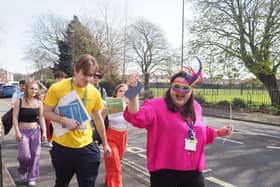 Students and staff taking part in the colour walk