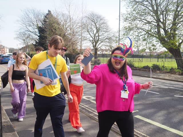 Students and staff taking part in the colour walk