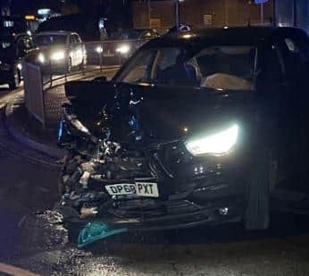 Damage to the car which hit the bus.