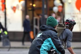 A Deliveroo cycle rider. Pic: PA