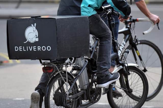 A Deliveroo cycle rider. Pic: PA