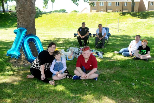 Front from left, Casie Cowley with her children Ella (7) and Leyton Cresdee (10) who had a social distanced birthday picnic with (back l-r) great uncle Andy Cowley, Nan Rebecca Cowley and friends Laura Cox and her son Kiam Parker also 10.
Picture: Sarah Standing (210520-8759)