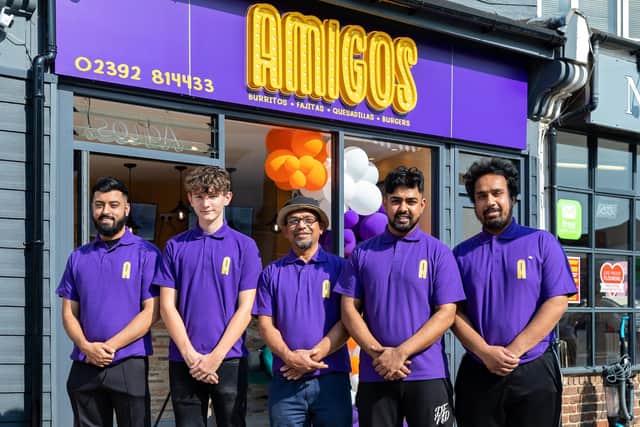 Staff at Amigos on Eastney Road. Pictured: Saleh Choudhury (29), Alfie Flooks (16), Chef Jamal Rahman (54), Assistant Manager Rafi Rahman (26) and Hassan Rahman (23). Picture: Mike Cooter (230821)