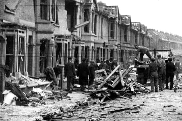 Clearing up. Newcomen Road, Stamshaw, after a flying bomb fell on July 15, 1944 - the last bomb to fall on Portsmouth. Picture: The News.
