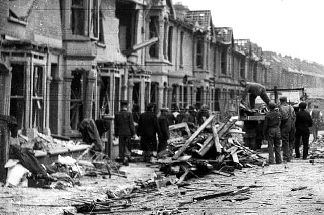 Clearing up. Newcomen Road, Stamshaw, after a flying bomb fell on July 15, 1944 - the last bomb to fall on Portsmouth. Picture: The News.