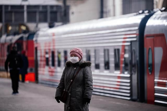 A woman wearing a face mask. Picture: DIMITAR DILKOFF/AFP via Getty Images
