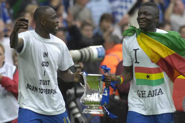 John Utaka and Sulley Muntari with the FA Cup. Picture: Will Caddy