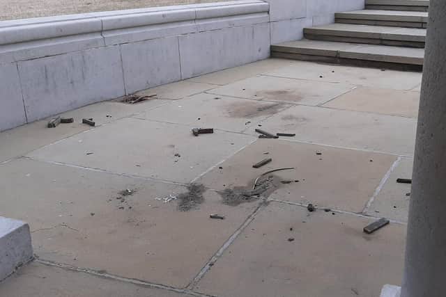 Broken parts of the naval memorial photoed on Friday evening following a spate of vandalism at the site.