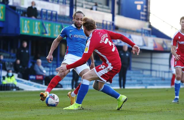 Marcus Harness beating Connor Ogilvie on his way to setting up Sean Raggett for Pompey's opener. Gaffer for a Day Lee Laver believes the winger deserves man of the match for that moment of quality. Picture: Joe Pepler