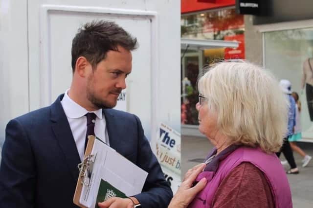 Stephen Morgan MP talking with a constituent