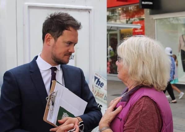 Stephen Morgan MP talking with a constituent