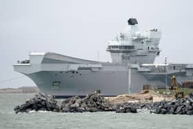 The Royal Navy Aircraft carrier HMS Queen Elizabeth passes Southsea Castle as she leaves Portsmouth harbour to deploy to northern Europe with Nato allies on Thursday November 10, 2022. Photo: Andrew Matthews/PA Wire