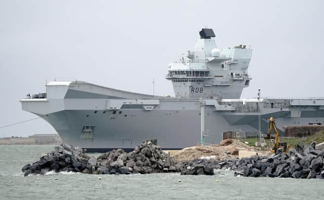 The Royal Navy Aircraft carrier HMS Queen Elizabeth passes Southsea Castle as she leaves Portsmouth harbour to deploy to northern Europe with Nato allies on Thursday November 10, 2022. Photo: Andrew Matthews/PA Wire