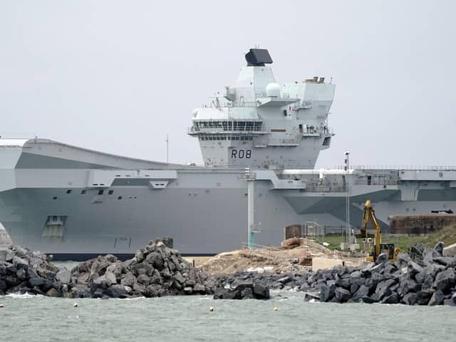 The Royal Navy Aircraft carrier HMS Queen Elizabeth passes Southsea Castle as she leaves Portsmouth harbour to deploy to northern Europe with Nato allies on Thursday November 10, 2022. Photo: Andrew Matthews/PA Wire