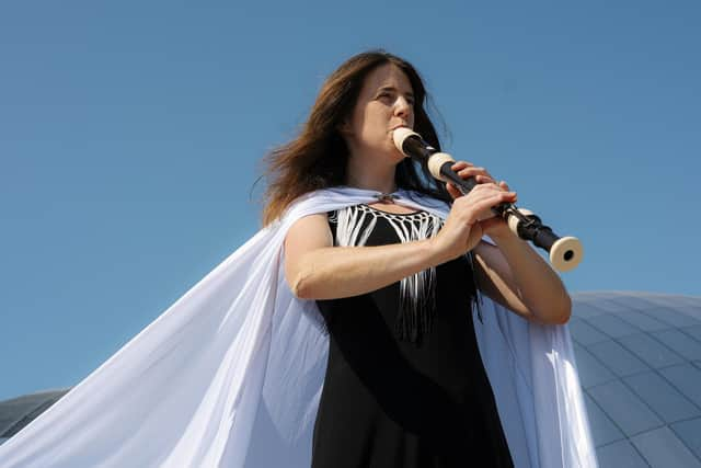 Liza Bec is a musician from Portsmouth who has the rare condition music-triggered epilepsy, but is able to keep playing using their roborecorder. Picture by Ben Hughes