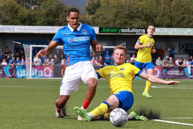 Hawks' Jake McCarthy puts in a tackle of Pompey's Haji Mnoga in last summer's friendly meeting at Westleigh Park Picture: Paul Collins