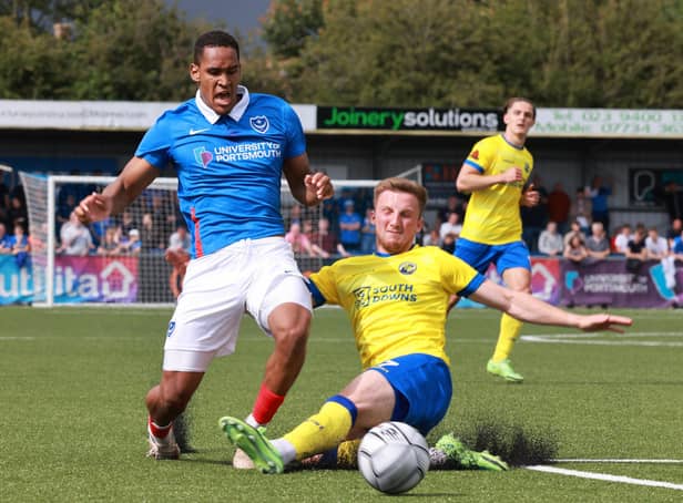 Hawks' Jake McCarthy puts in a tackle of Pompey's Haji Mnoga in last summer's friendly meeting at Westleigh Park Picture: Paul Collins