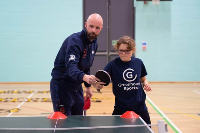 Coach Ashley with schoolpupil Izzy. 