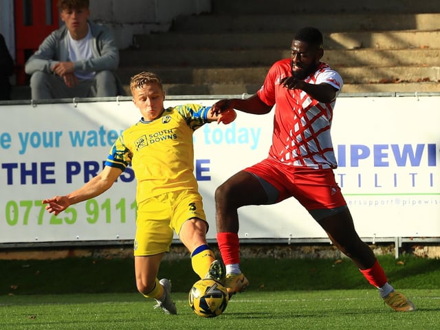 Joe Newton battles for possession. Picture by Dave Haines