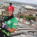 Southern Brave batter Joe Weatherley prepares for his 100m abseil down the Spinnaker Tower.