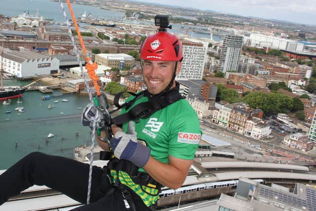 Southern Brave batter Joe Weatherley prepares for his 100m abseil down the Spinnaker Tower.