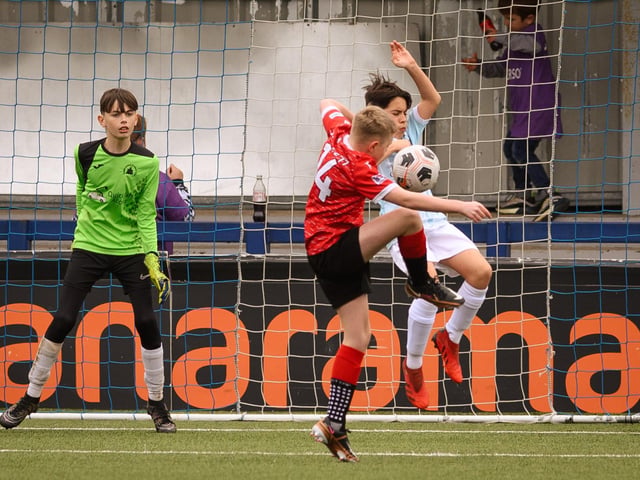 Action from the Portsmouth Youth League Geldard Invitation Cup final between Jubilee 77 U13s and Castle United U13s (light blue and white kit). Picture: Keith Woodland (190321-605)
