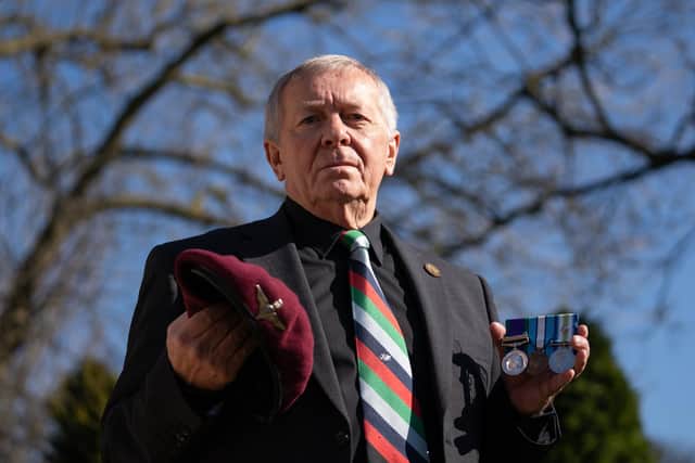 Falklands War veteran Tom Herring with his beret and medals at his home in Brickhill, Bedfordshire