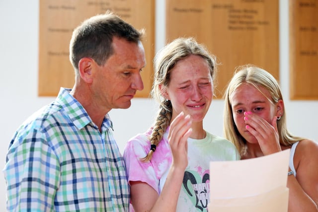 Tears of joy for Maddy Oliver who is going to read geography at Oxford. She is pictured with her father, Graeme, and sister, Beatrice. A-level results, Portsmouth High School, Southsea. Picture: Chris Moorhouse (jpns 180822-14)