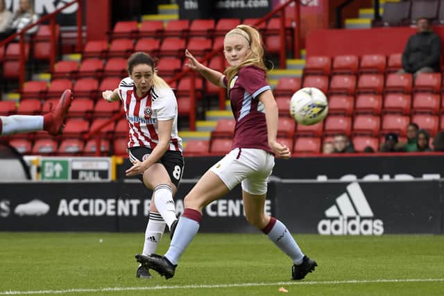 Evie Gane in action for Aston Villa Ladies against Sheffield United Women's Sophie Jones at Bramall Lane in September 2018. Picture: George Wood/Getty Images