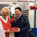 Alan Mak MP hands out chocolates at the Royal Mail's Havant Delivery Office