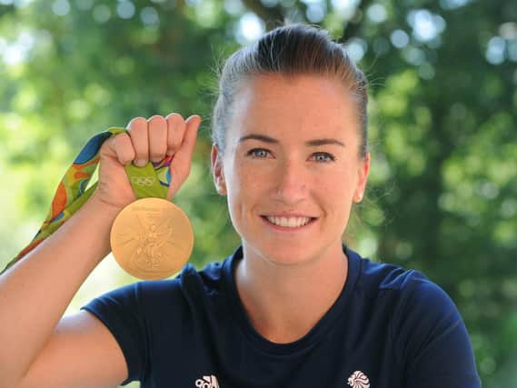 Maddie Hinch with her women's hockey gold medal from the Rio Olympics 2016. Photo by Jon Rigby