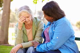 A generic stock photo of a woman comforting a grieving friend. See PA Feature ADVICE Ask Fiona. Picture credit should read: Alamy/PA. WARNING: This picture must only be used to accompany PA Feature ADVICE Ask Fiona.