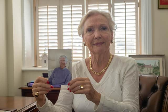 Patricia Hullfell with a picture of John at her home in Old Portsmouth.
Picture: Habibur Rahman